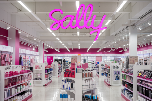 Shelves of diverse beauty products at a Sally Beauty store, featuring haircare and skincare items.